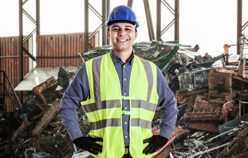 Workers using waste clearance services at a Barking construction site